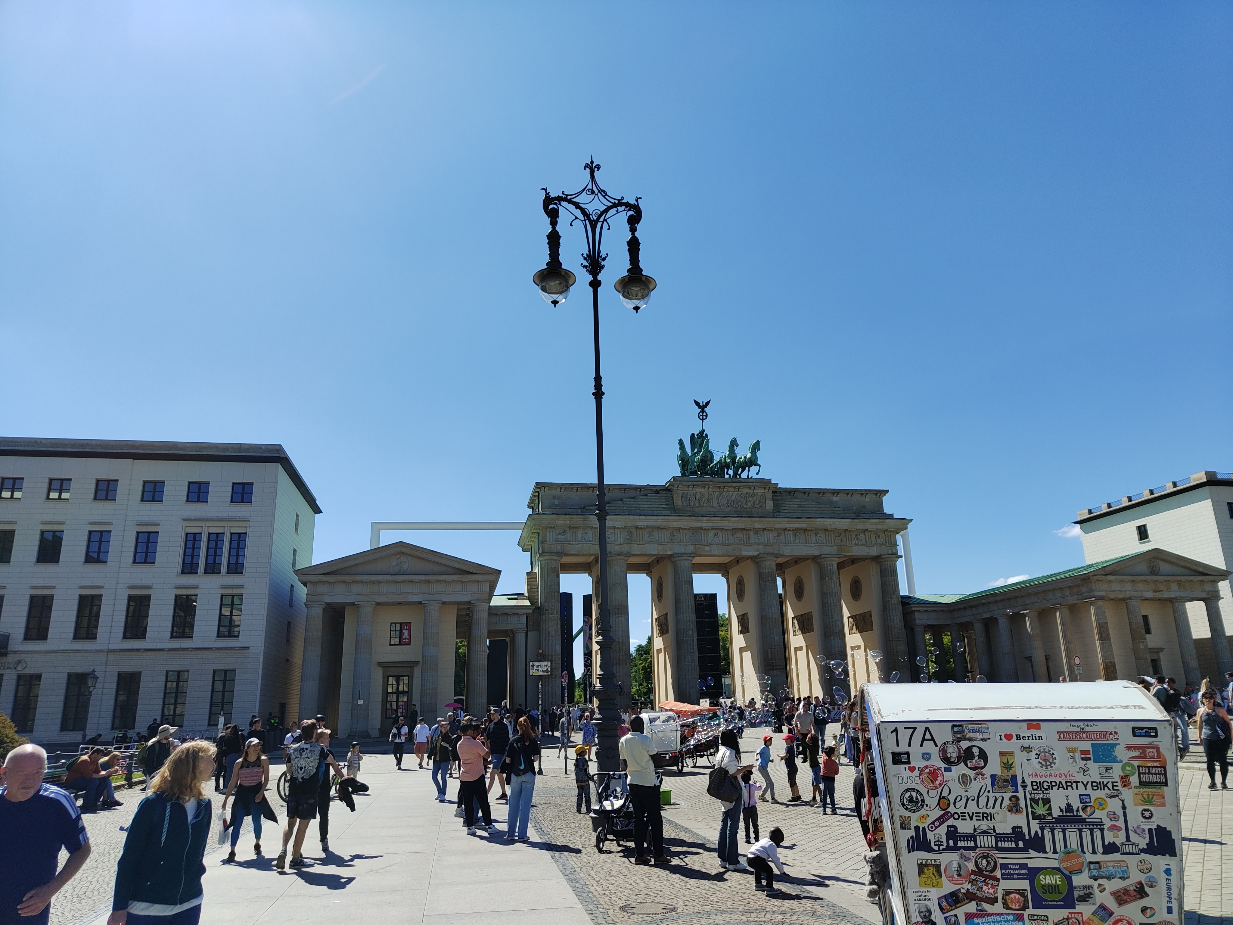 Bradenburg Gate in Summer full of tourists, Berlin, Germany.